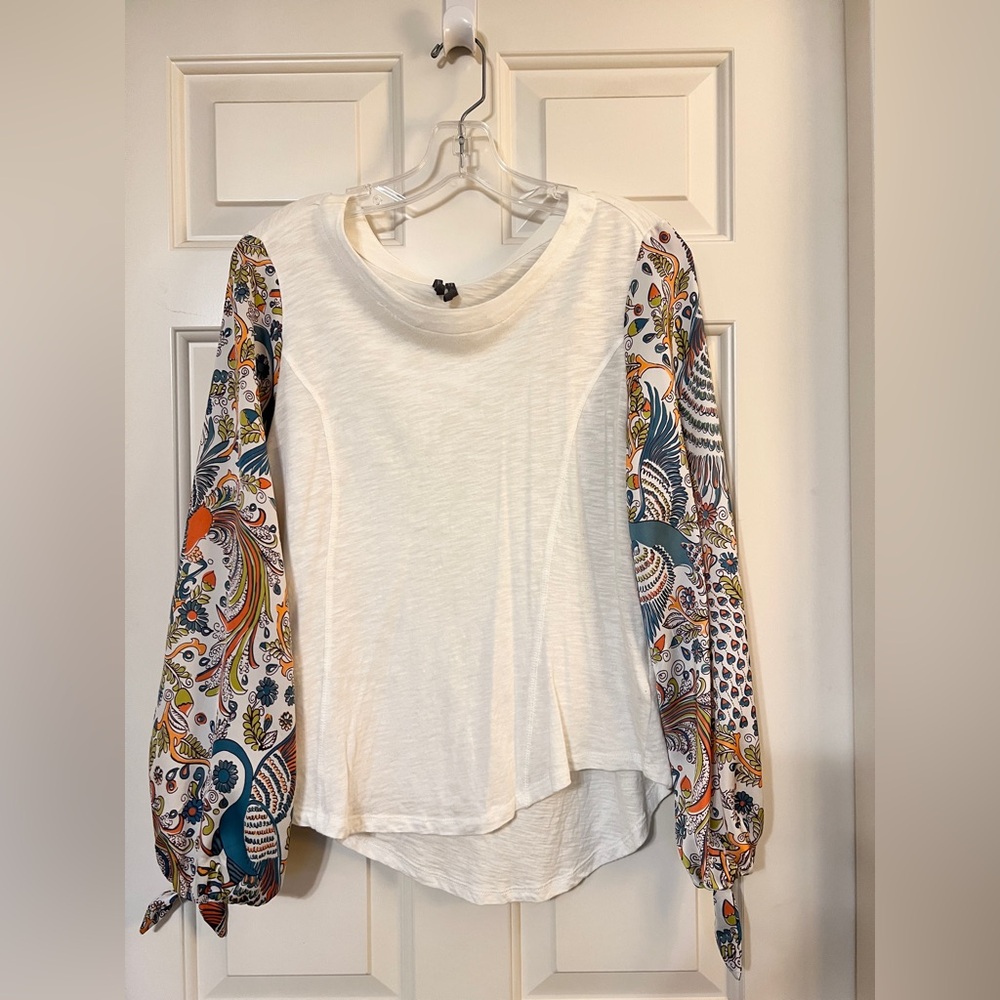Women’s top. Cotton shirt and rayon sleeves. Fun pattern and funky.